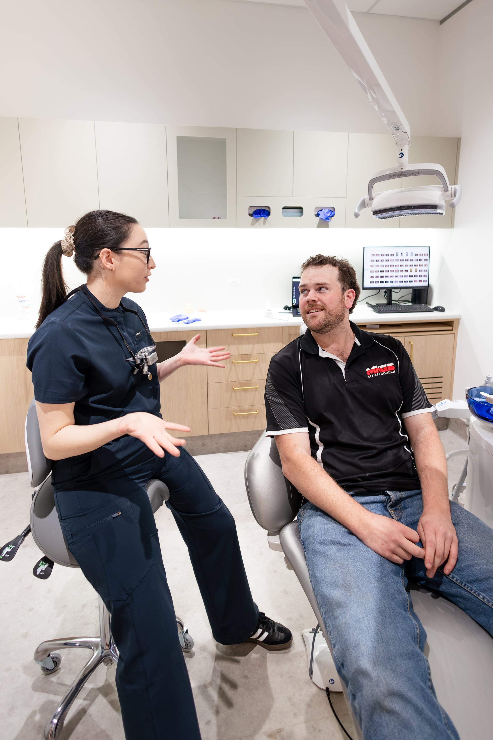 Dentist explaining preventive care options to a patient