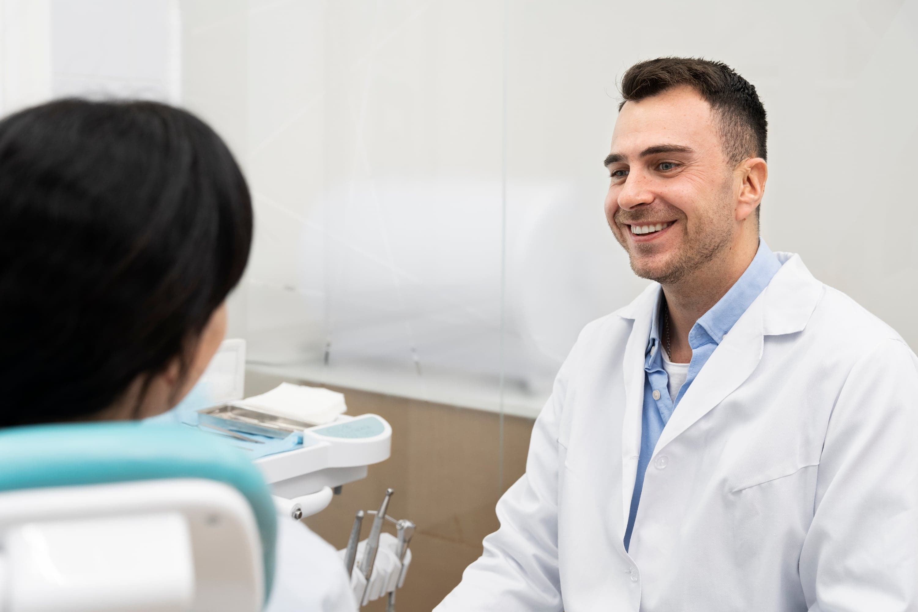 Dentist reviewing check-up findings with a patient