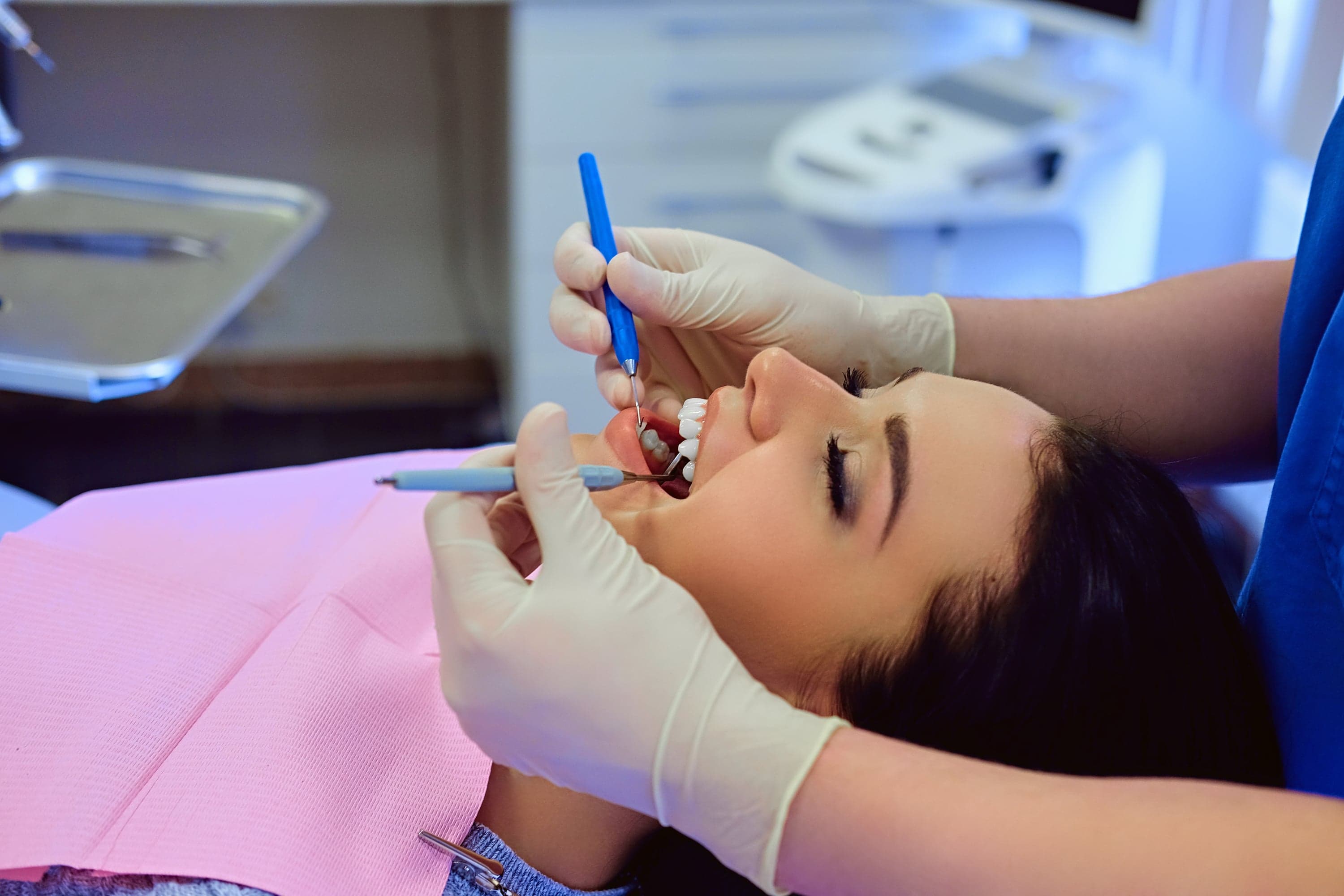 Dentist explaining preventive care options during a check-up visit