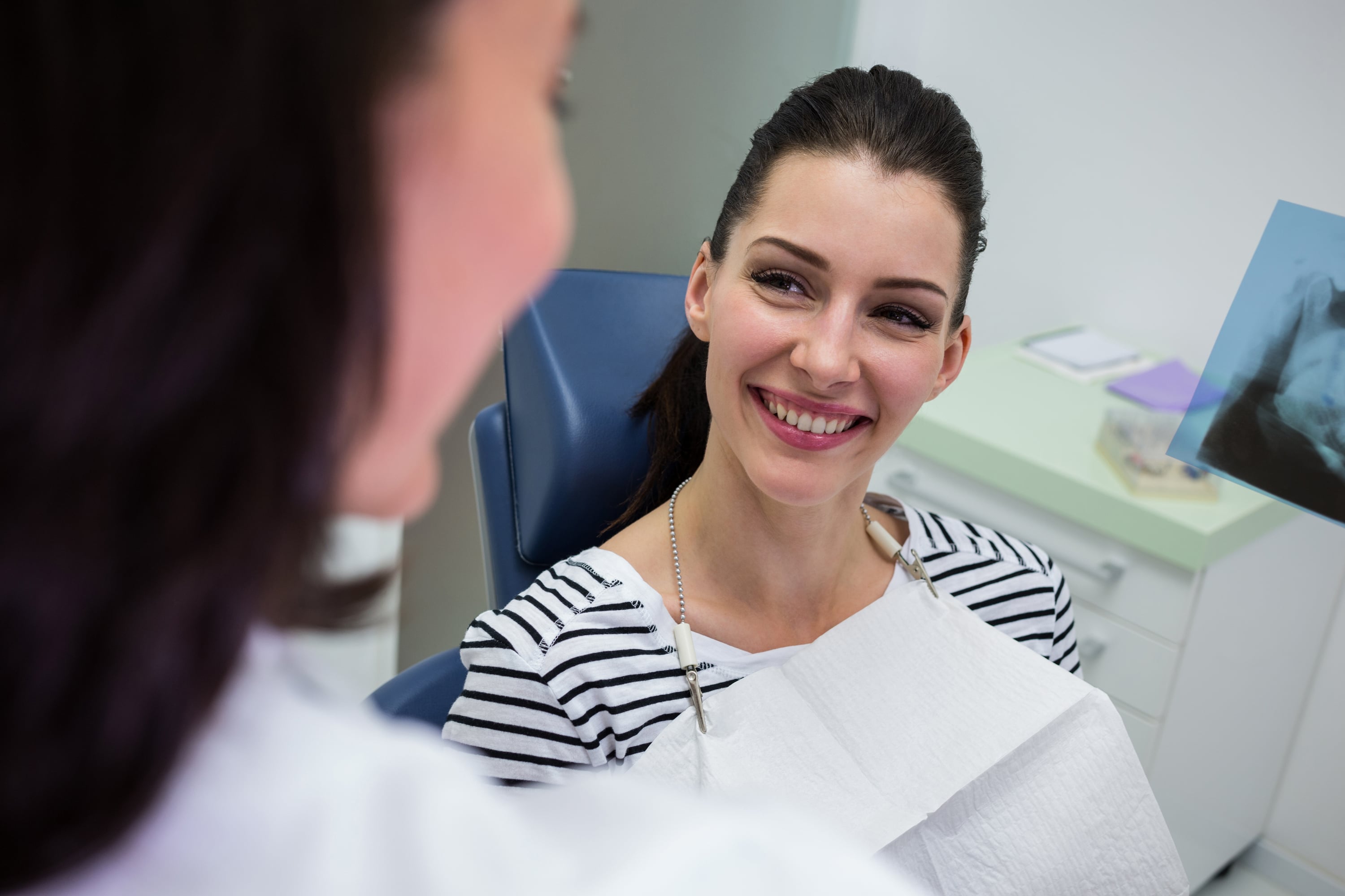 Dentist and patient reviewing a restorative treatment plan