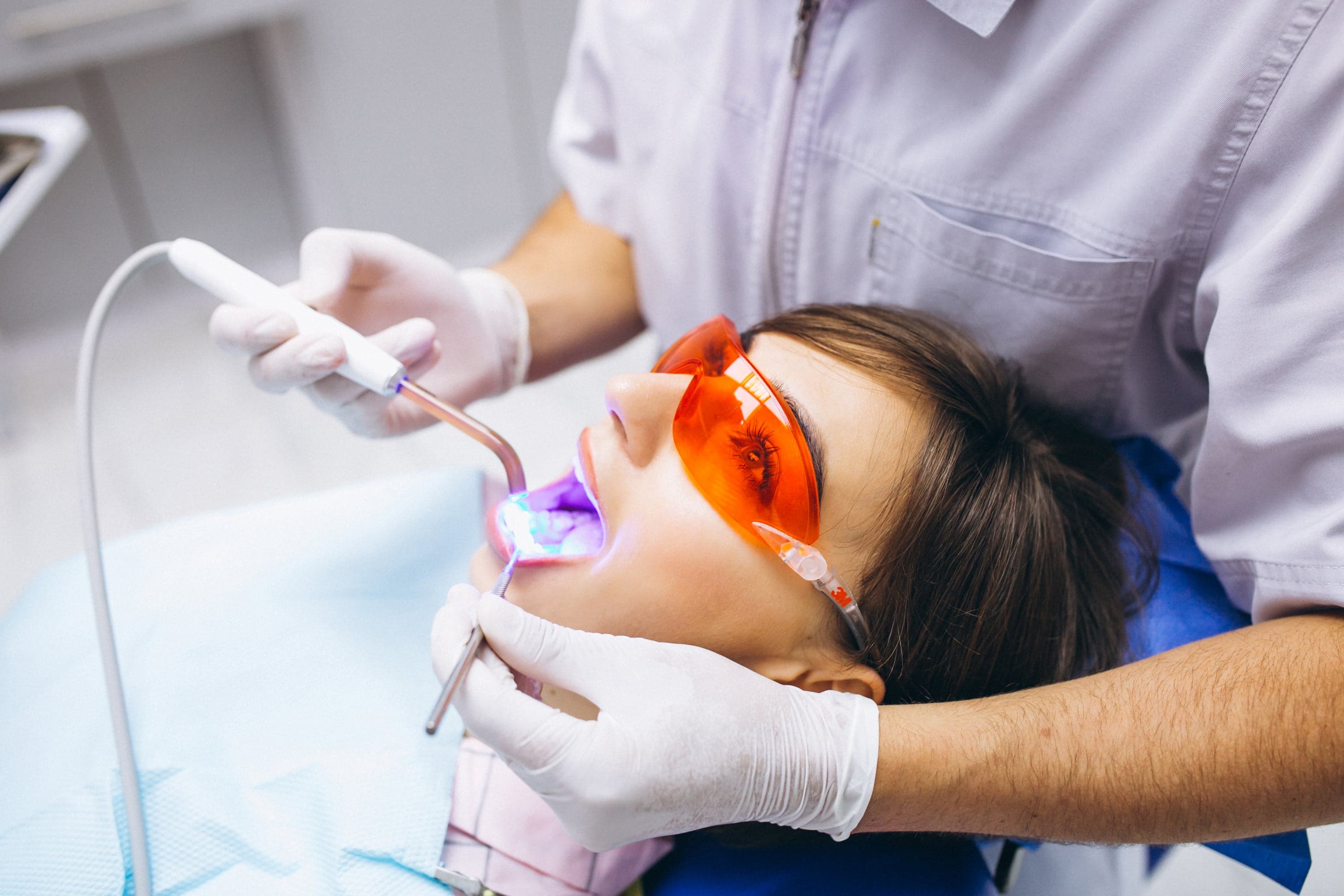 Dentist performing precise composite filling procedure at Joyner Family Dental