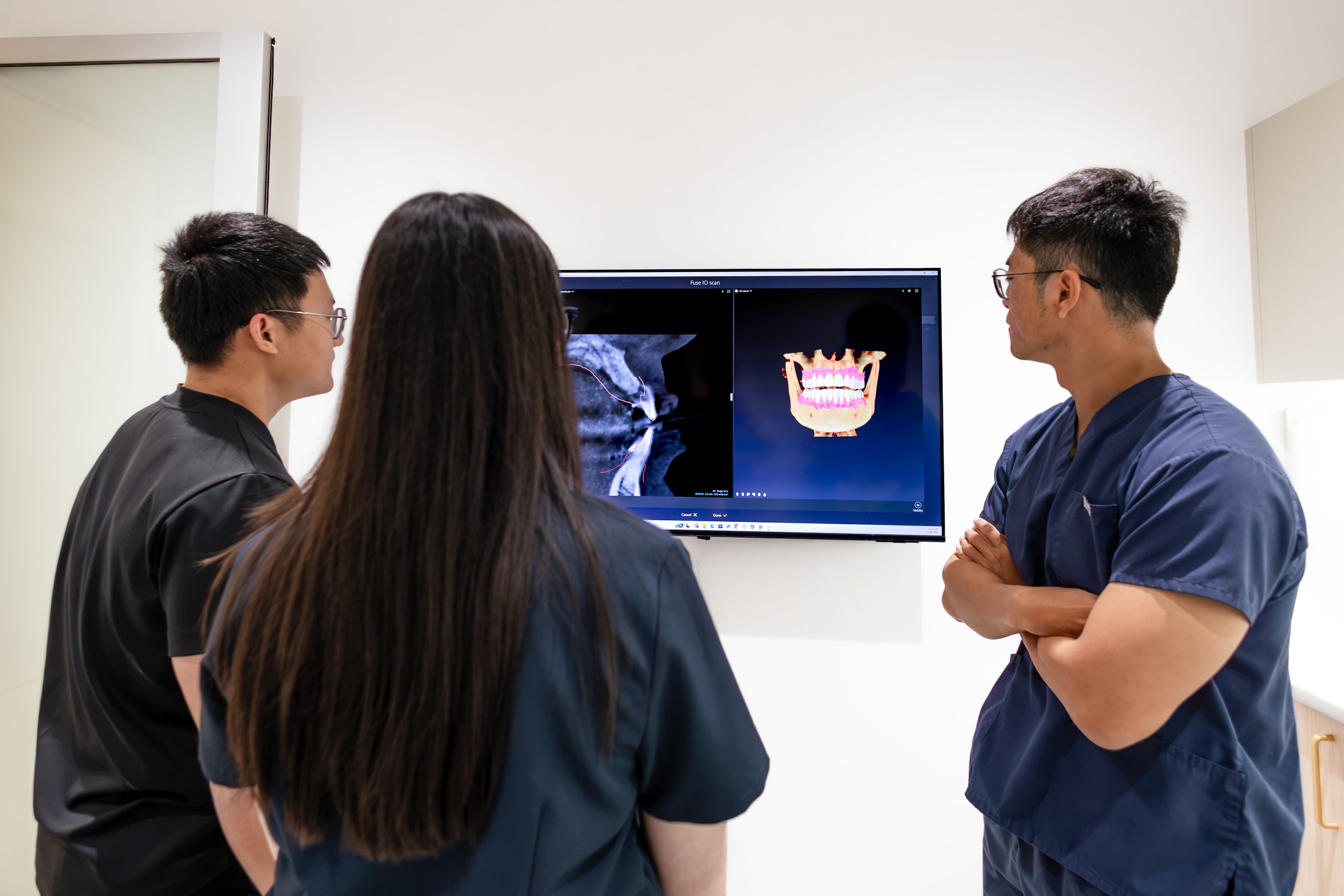 Dentist reviewing ClinCheck treatment simulation