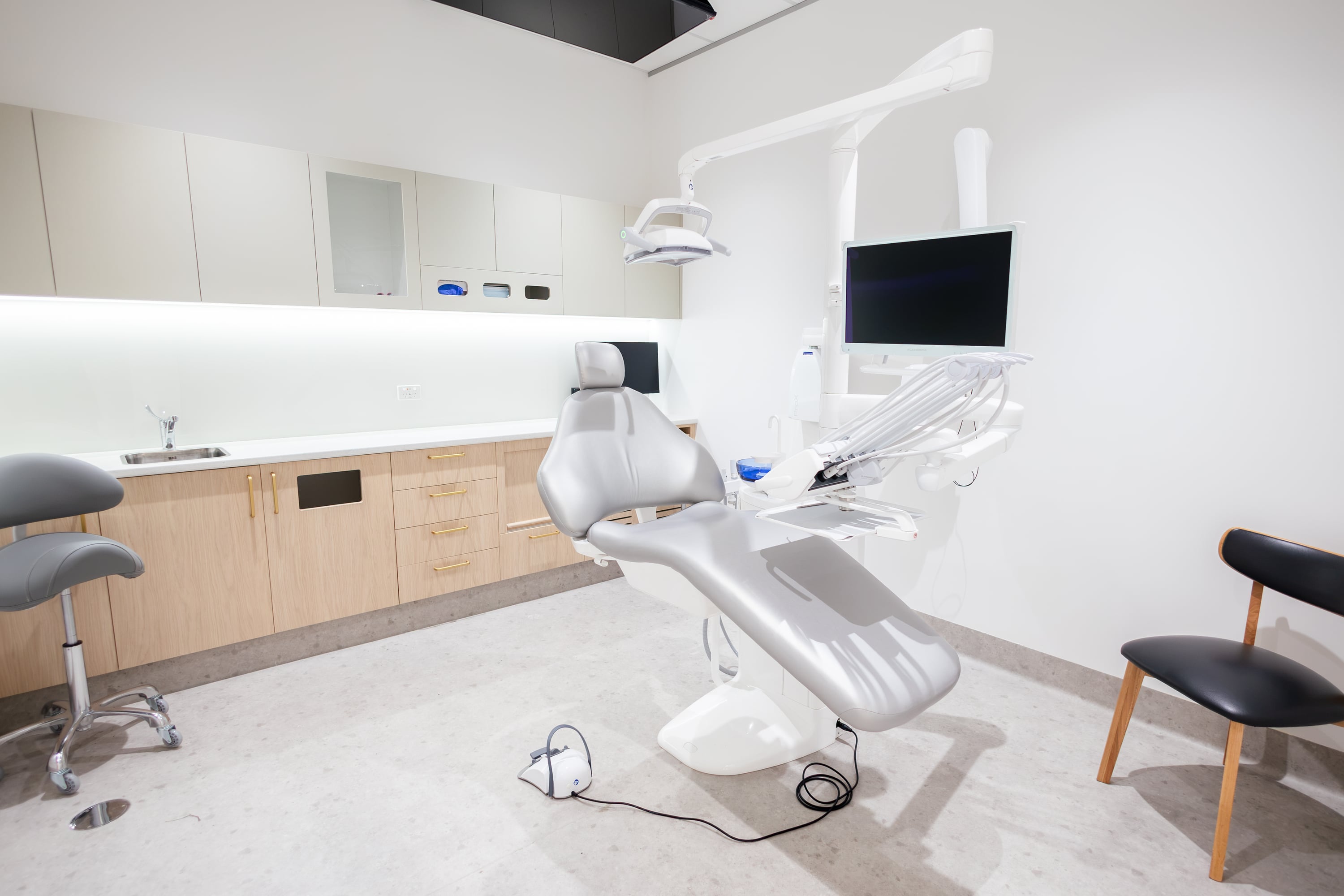Reception team helping a patient prepare for a dental visit