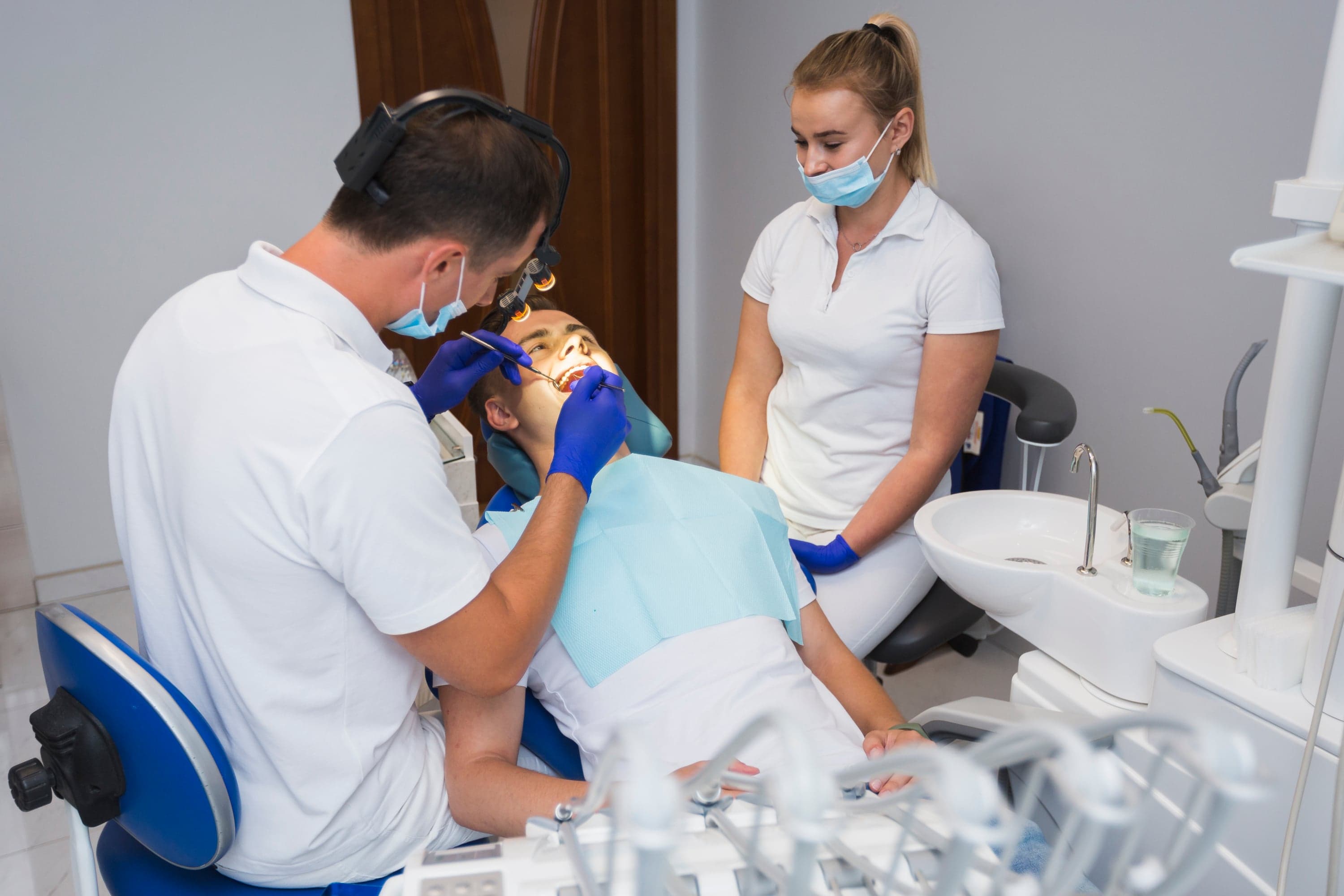 Dentist performing root canal treatment with focused precision at Joyner Family Dental