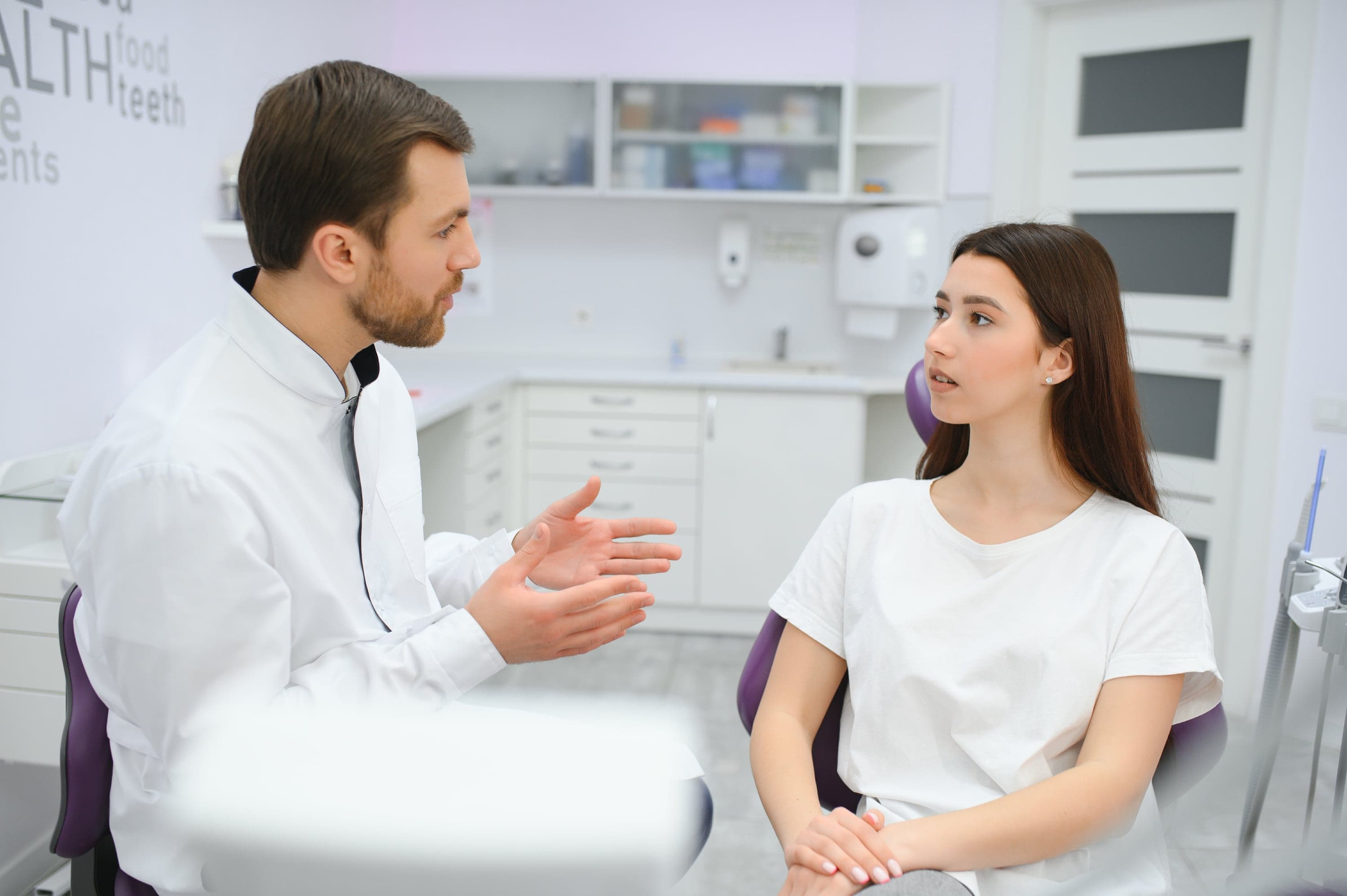 Dentist administering local anaesthesia for comfortable root canal treatment