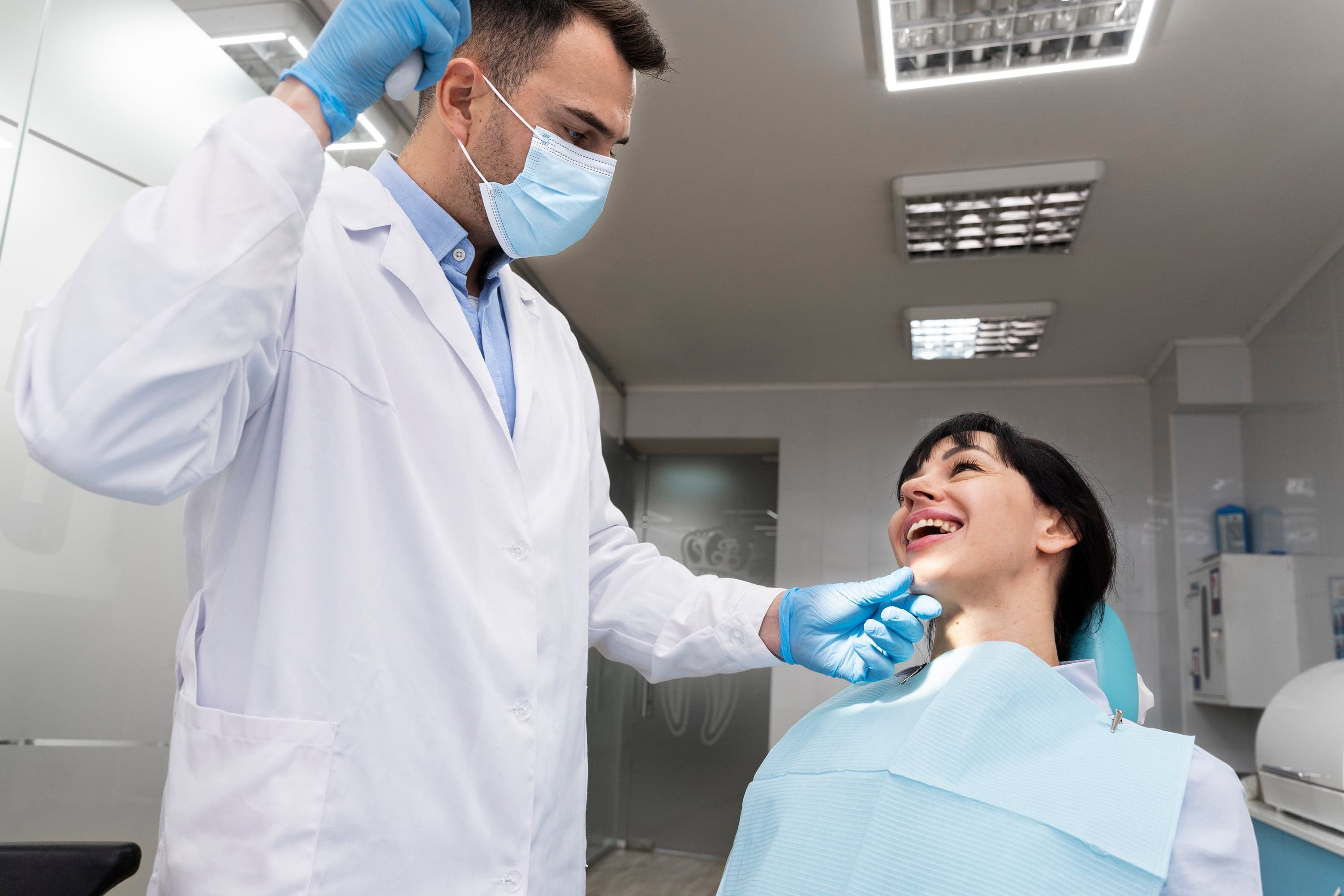 Dentist reviewing root canal treatment planning with a patient at Joyner Family Dental