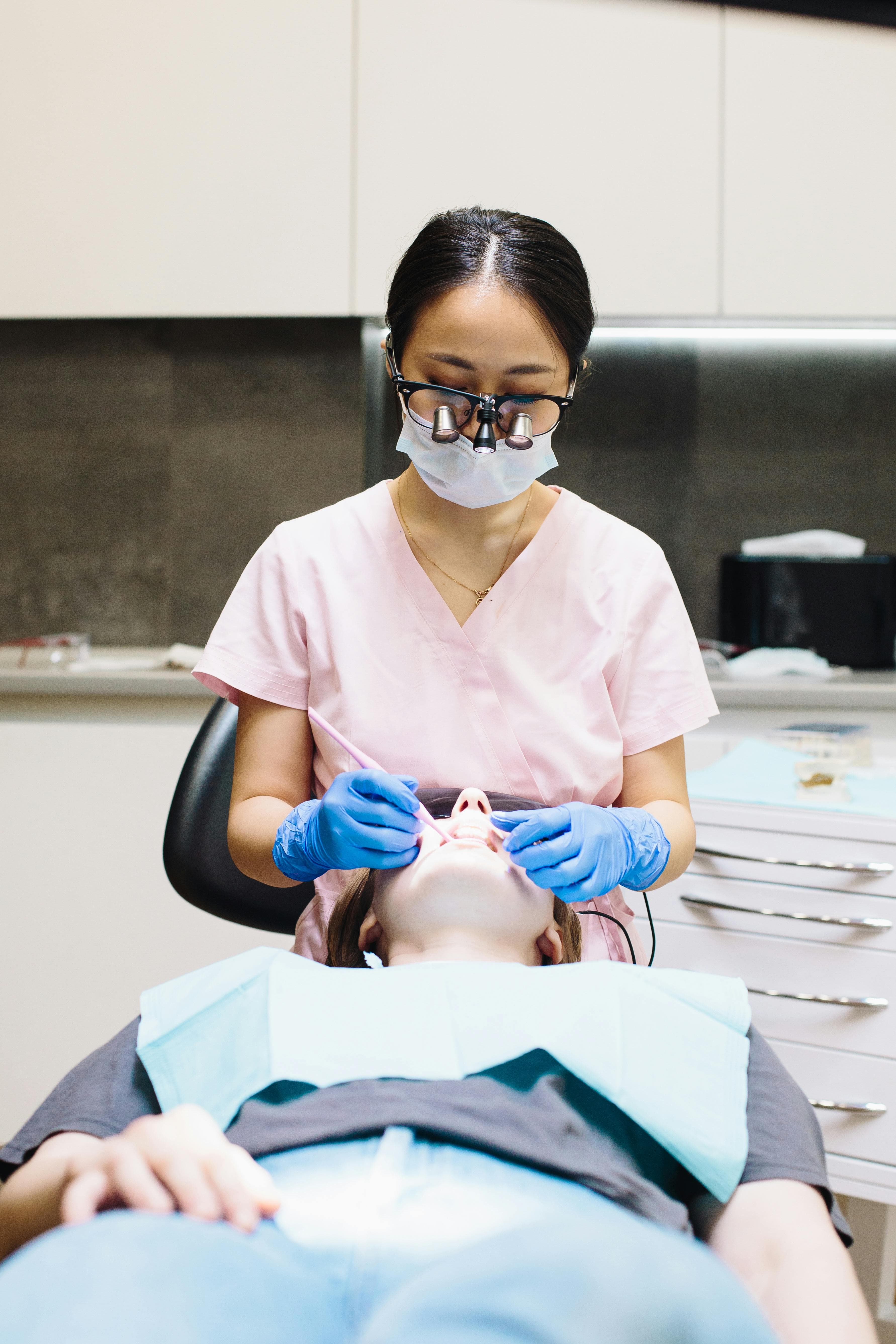 Dentist explaining X-ray results to a patient at Joyner Family Dental