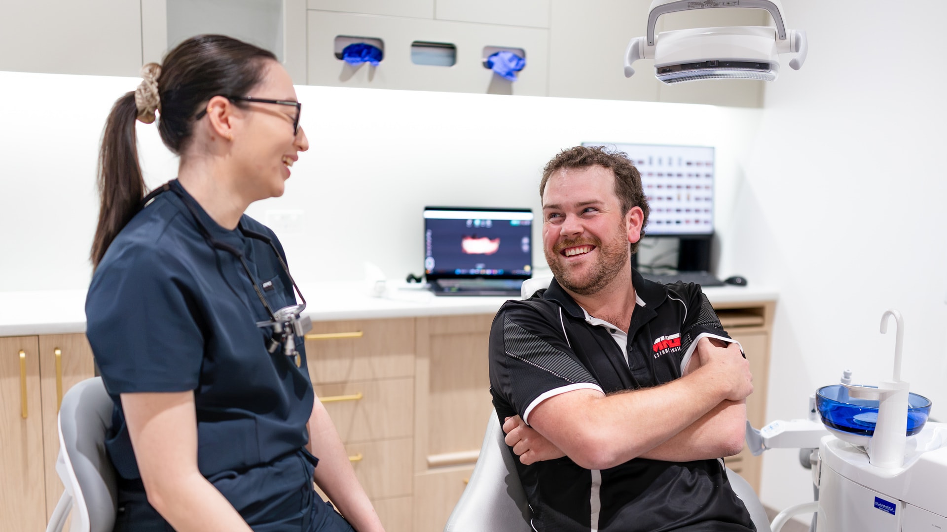 Calm consultation room at Joyner Family Dental with a screen showing a Digital Smile Design preview